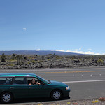 Saddle Road westbound from Hilo. We are passing Mauna Loa in the background and are just about at the 6,623' crest! Our faithful '99 Subaru does us well even taking us to the 9,300' Mauna Ke ...
